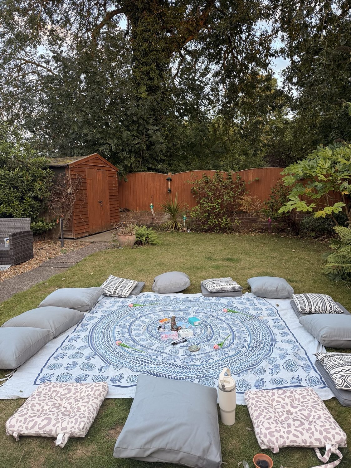 Cushions arranged in an outdoor circle for a HELD gathering